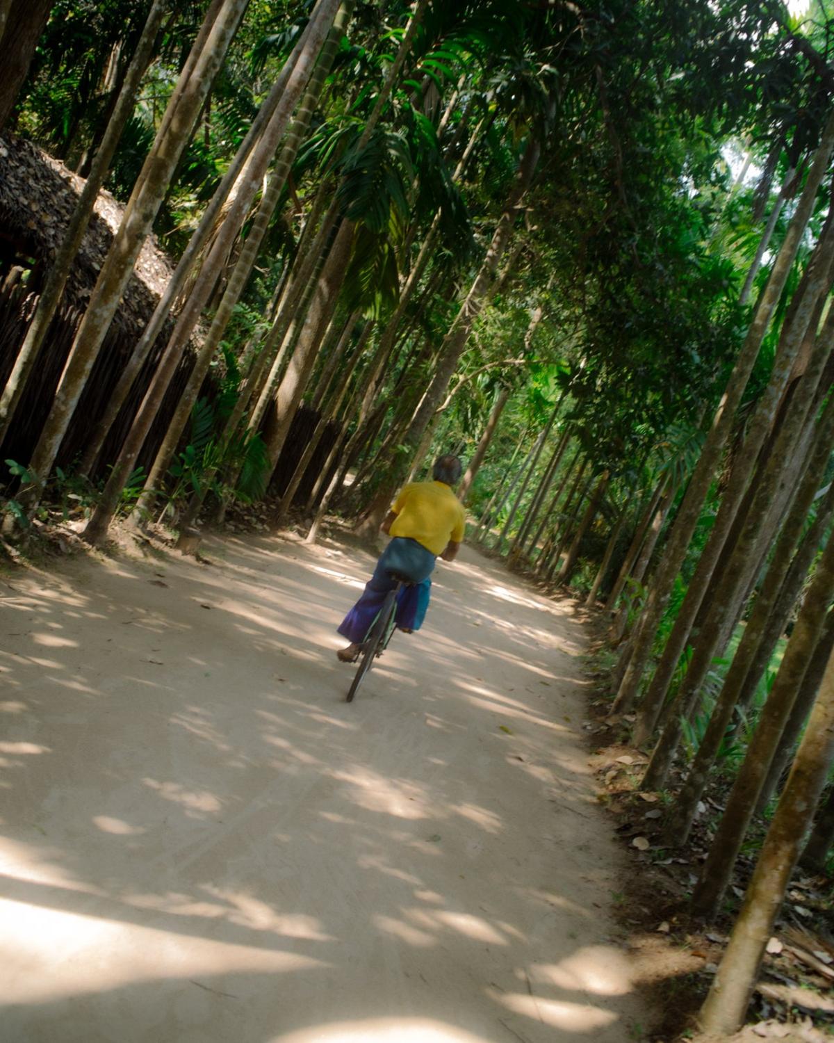 Viren cycling along the path at Ulpotha